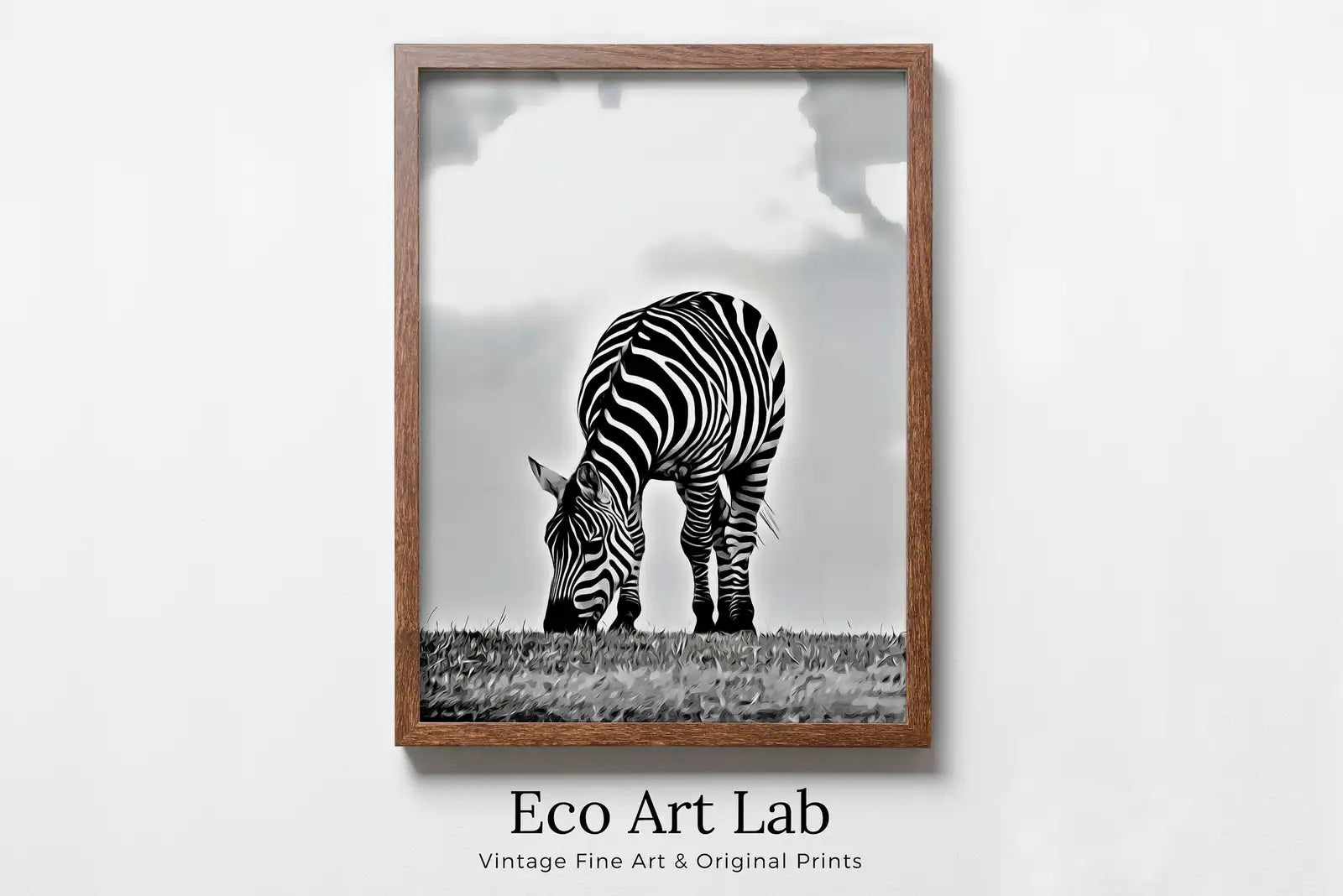 Framed view of Grazing Zebra Black and White Printable Wall Art. Zebra Digital Print Black and White Art Vertical Downloadable Art. Safari Animals Print – printable wall art digital download.