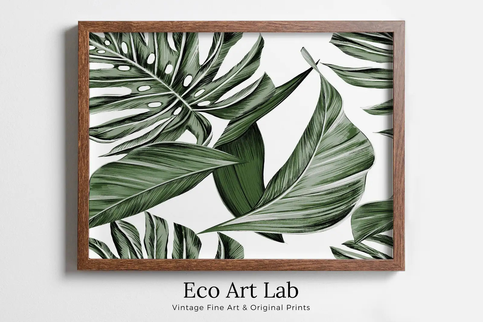 Framed view of Monstera and Palm Leaf Wall Art. Sage Green Botanical Prints Instant Download Tropical Wall Decor. Printable Leaf Painting, Tropical Foliage – printable wall art digital download.