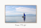 Samsung Frame TV Art 4K Blue Sailboat Painting Nautical Wall Art. Instant Download Boat Painting for the Frame TV. Sailing Ocean Art for TV displayed on Samsung Frame TV on a living room wall.