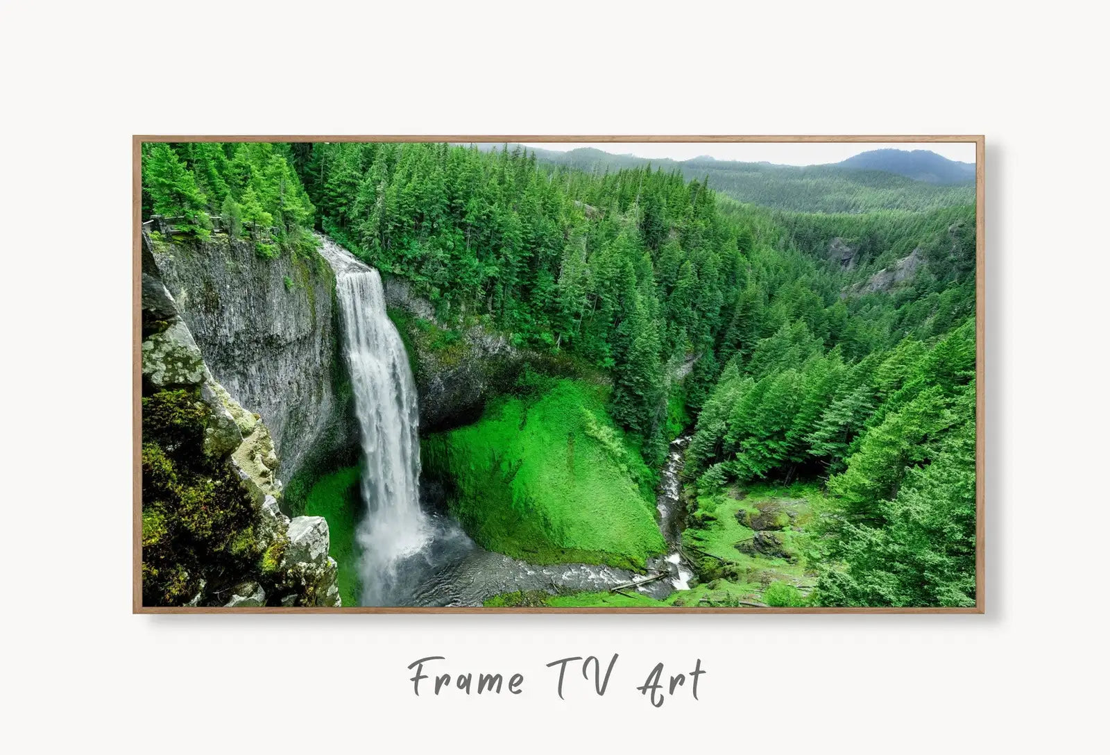 Samsung Frame TV Art 4K Waterfall in Green Forest Photography Art. Instant Download Art for TV. Colorful Frame TV Art. Nature Wall Art displayed on Samsung Frame TV on a living room wall.