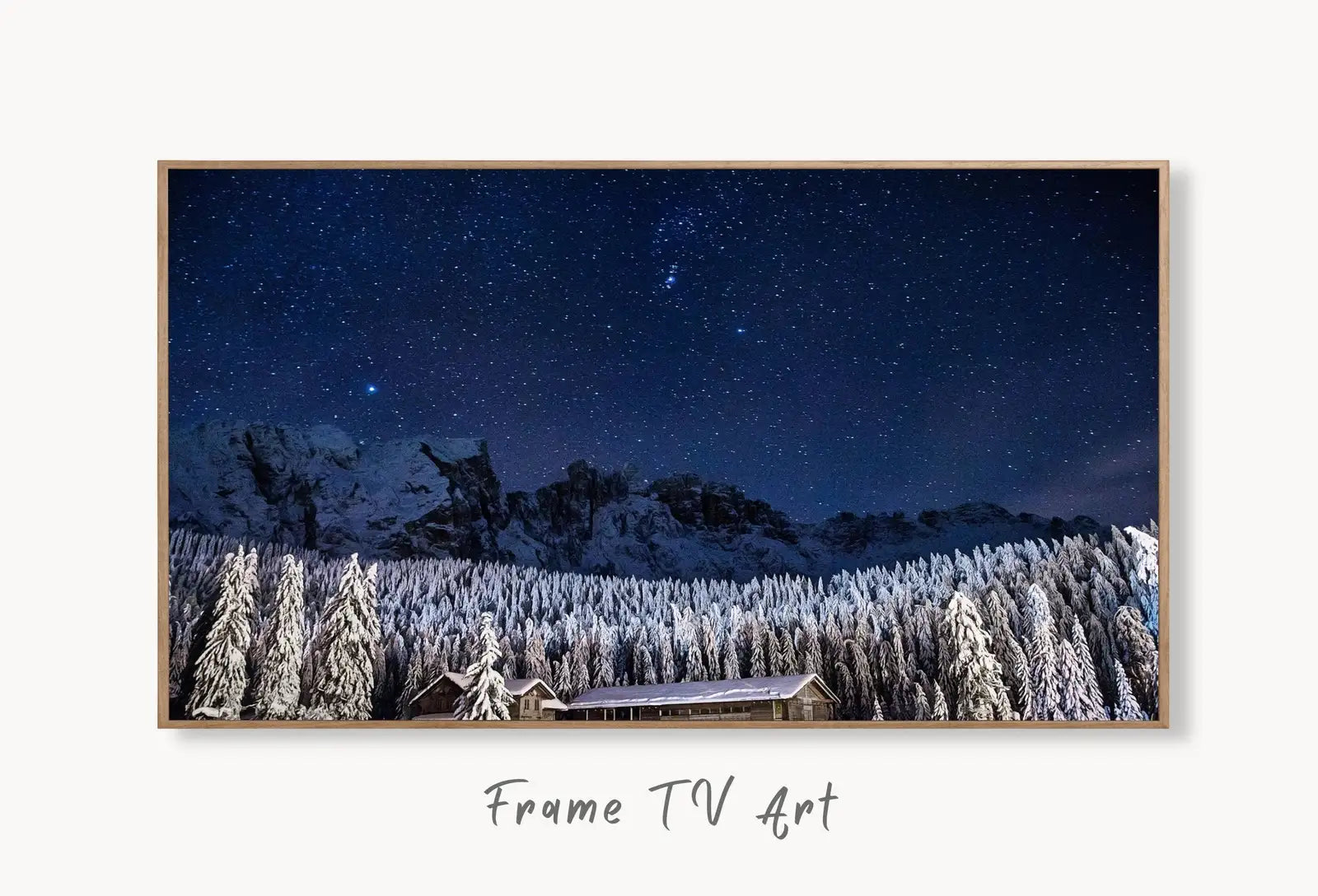 Samsung Frame TV Art 4K Winter Cabin. Snowy Mountains at Night. Landscape Digital Painting. Instant Download Winter Art for Samsung Frame TV displayed on Samsung Frame TV on a living room wall.