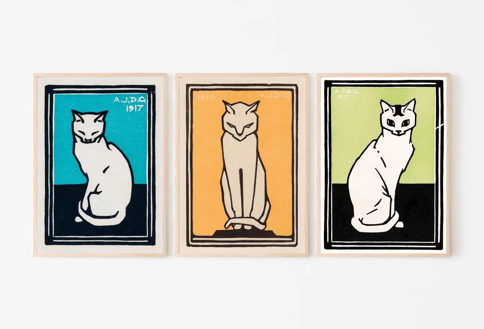 Framed view of Sitting Cats Set of 3 Prints Vintage Art Nouveau Prints Gallery Wall Set. Instant Download Cat Paintings Julie De Graag Printable Wall Art – printable wall art digital download.